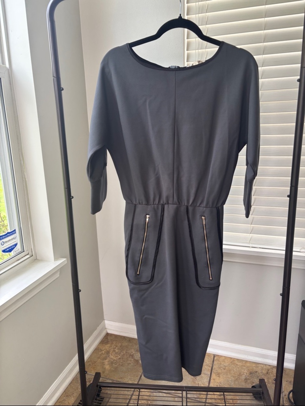 Elegant Black Midi Dress with Zip Pocket Detail
